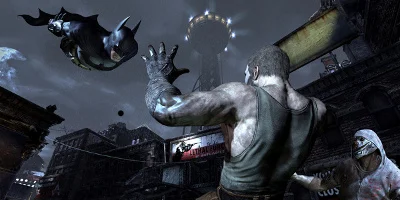 Batman, flying down, out of the sky, onto a pair of enemies