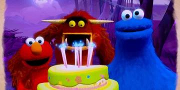 Elmo, Seamus and the cookie monster, with a birthday cake