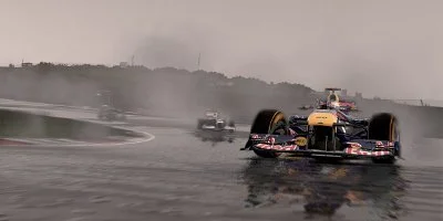 A Red Bull F1 Car, under-steering on the very wet track