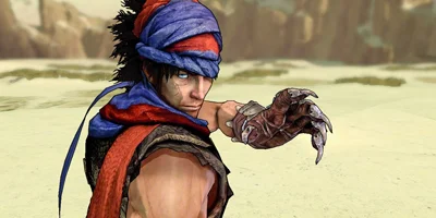 The prince, holding up his claw-like hand